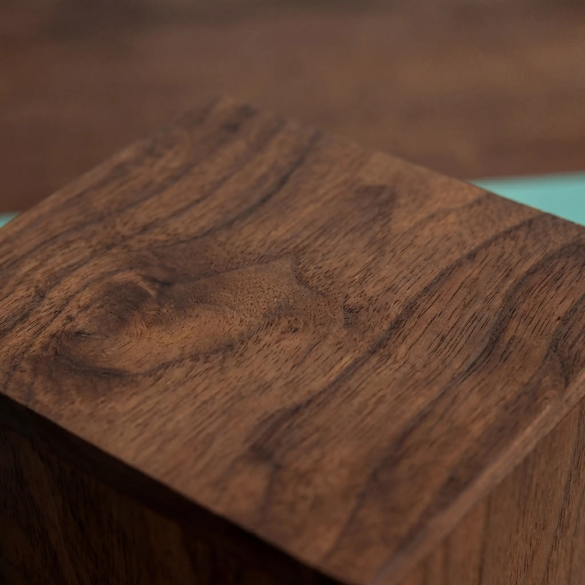 Walnut wood grain detail showing Rubio Monocoat oil finish